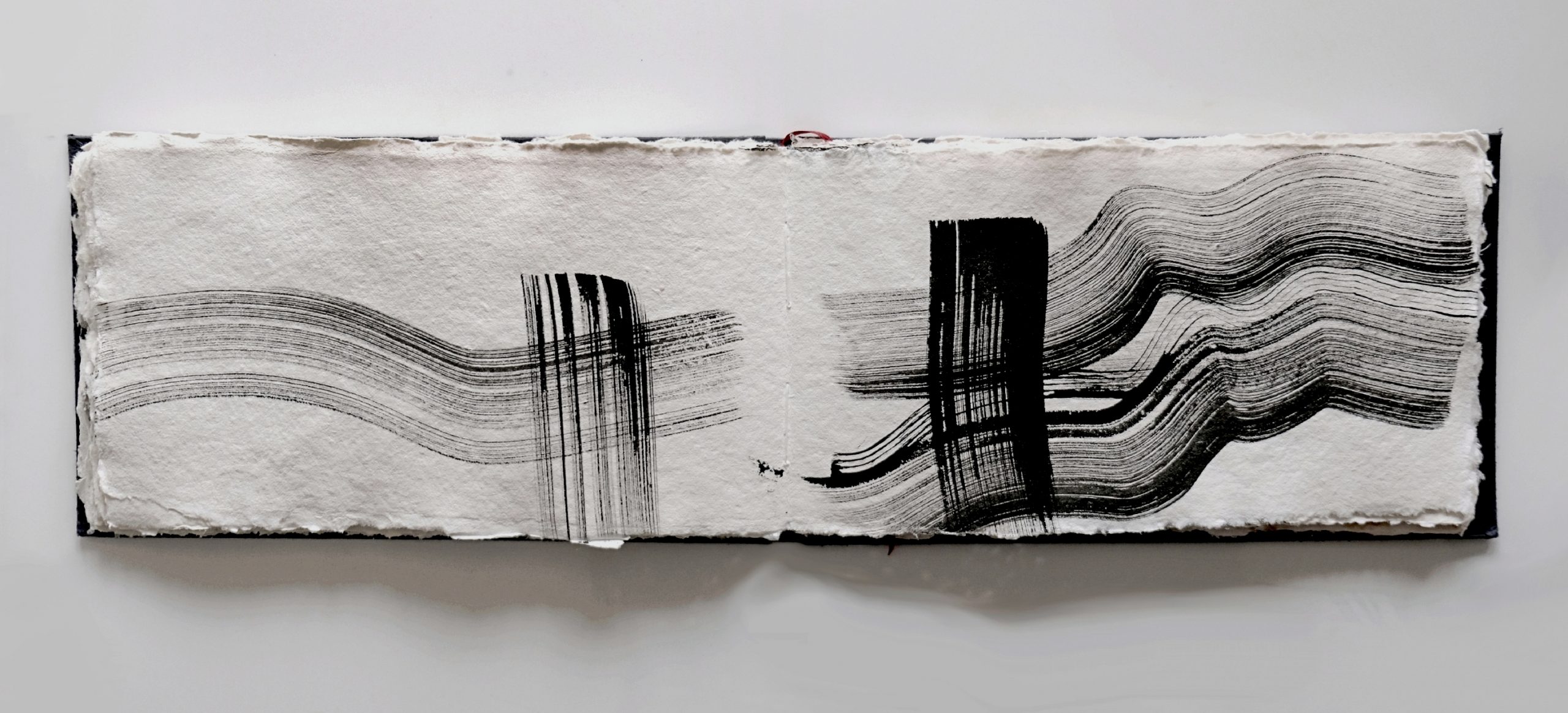 Drawing diary, an excerpt from a visual poetry artist book No. 3, Indian ink on handmade paper 17 x 29 x 1.5 cm, 2024